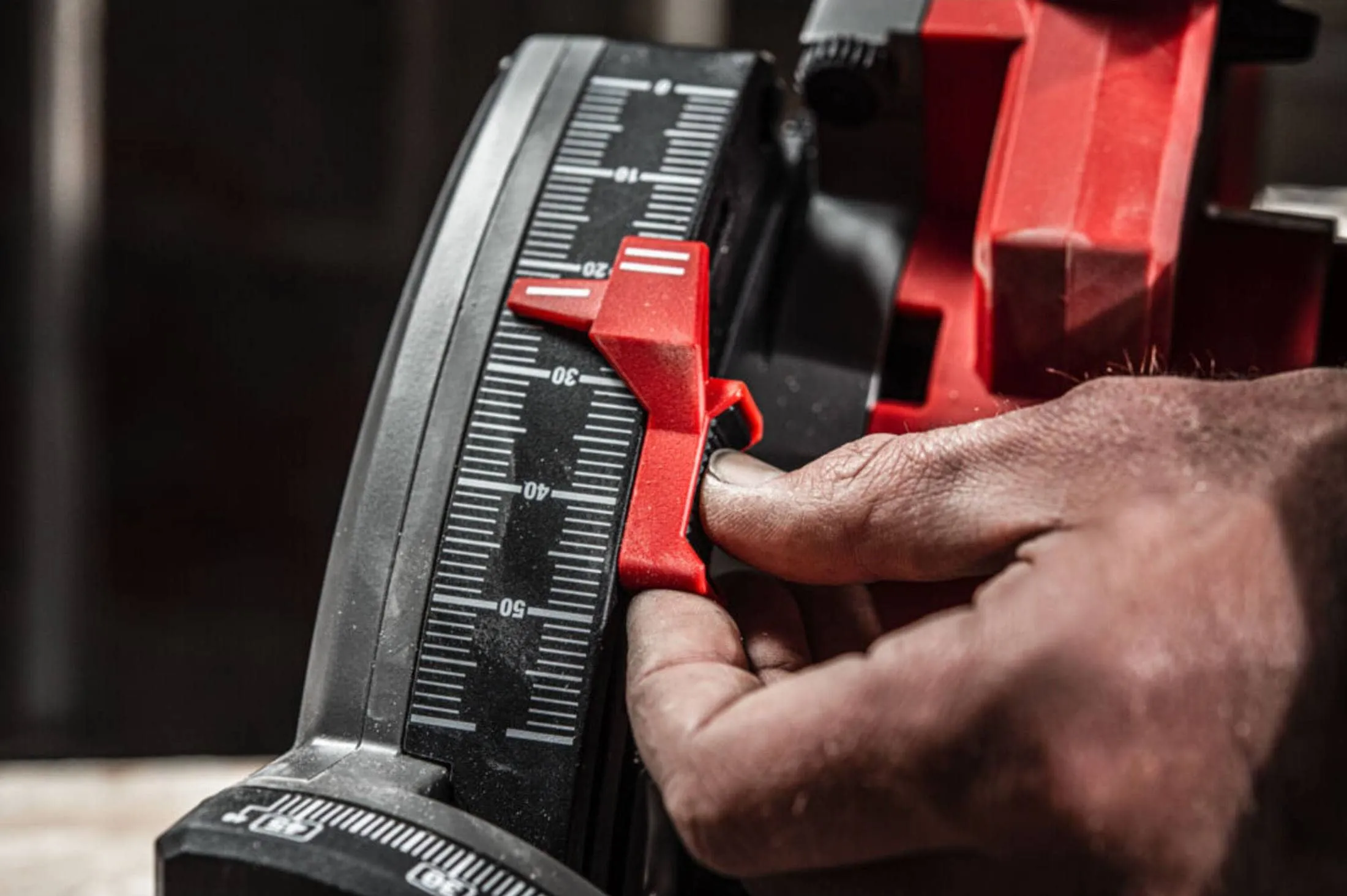 man controls saw setting