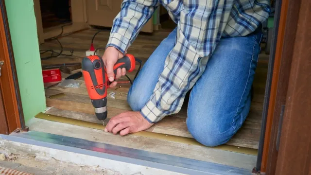 man installing wear threshold