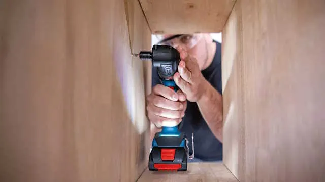 man working with FlexiClick attachment