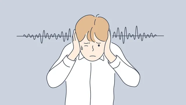 man covers ears