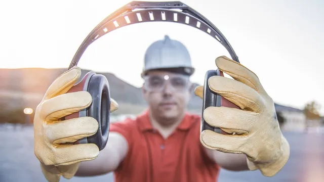 man offers hearing protection