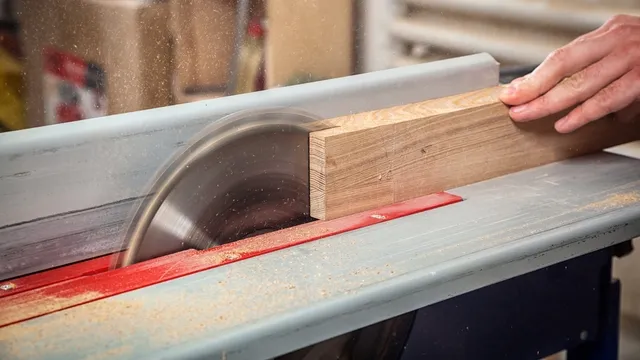 sawing wood on table saw